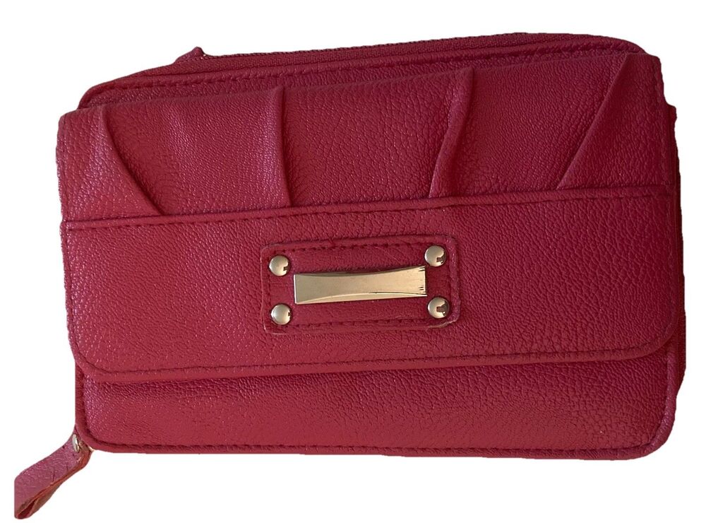 Pink long wallet with snap and zippers lots of compartments with card holder